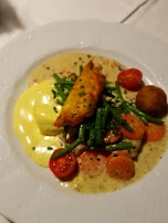 Schwarzwälder-hof-teller Schweinefilet Mit Dreierlei Saucen Gemüse Und Rösti
